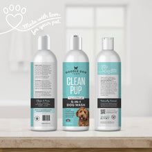 Load image into Gallery viewer, Made with love for your pet written in script by a heart paw graphic in top left. Clean Pup 5-in-1 Dog Wash bottle shown three times, so all sides of label are shown. The bottles are sitting on bathroom counter with white blurred window in background
