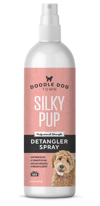 single white bottle of Doodle Dog Town Silky Pup Professional Strength Detangler Spray with pink label with goldendoodle dog on label