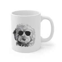 Load image into Gallery viewer, black and white goldendoodle with black sunglasses graphic on white ceramic mug with handle on right side

