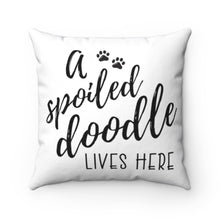 Load image into Gallery viewer, One white square throw pillow that reads A Spoiled Doodle Lives Here in black script font with two little paws