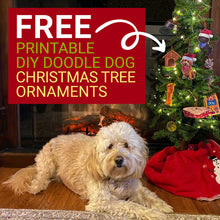 Load image into Gallery viewer, FREE Printable DIY Doodle Dog Christmas Tree Ornaments Craft. Cute blond mini Goldendoodle sitting on wood floors by fire place next to small Christmas tree with the DIY ornament crafts hanging on tree
