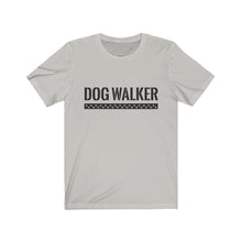 Load image into Gallery viewer, black text that reads "dog walker" in a cool Army-like font with A trail of paw prints inside a rectangle underneath the text on silver T-shirt