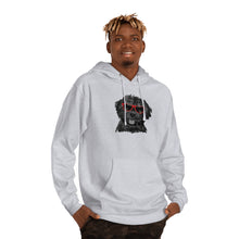 Load image into Gallery viewer, oung african american man wearing light gray hoodie sweatshirt with both hands in his pockets. He's wearing camo pants and there is a black dog illustrations with red sunglasses on the front of the hoodie.