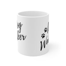 Load image into Gallery viewer, white ceramic mug showing Dog Walker script font and two paws on both sides
