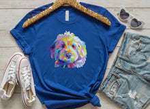 Load image into Gallery viewer, royal blue t-shirt tied in knot with colorful Goldendodle dog pop art graphic on front of t-shirt. gold sequence hanger, white conver shoes with red stripe, white heart sunglasses and jean shorts with holes surrounding the shirt