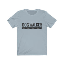 Load image into Gallery viewer, black text that reads "dog walker" in a cool Army-like font with A trail of paw prints inside a rectangle underneath the text on grayish blue T-shirt