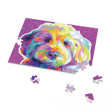 Load image into Gallery viewer, puzzle of goldendoodle dog&#39;s face, bright colors, purple outline, 4 pieces lying outside the put together part
