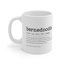 Load image into Gallery viewer, a white ceramic mug that includes black text in the format of a dictionary. It reads &quot;bernedoodle [ber•na•doo•dle] noun - a clever and gentle crossbreed between a Bernese Mountain Dog and a Poodle; affectionate; extremely loyal; loving companion; adores people; and will always be your best friend. Synonyms: doodle, dood, handle on left side
