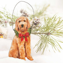 Load image into Gallery viewer, tan goldendoodle wooden ornament in snow with green tree branch and acorns in background

