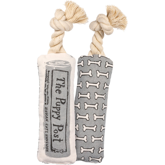 white and gray newspaper rope squeak dog chew toy