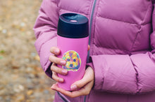 Load image into Gallery viewer, Colorful Cavapoo sticker on purple thermos held by girl with purple puff coat on
