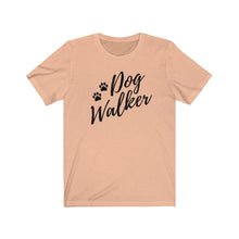 Load image into Gallery viewer, Black trendy script font That reads dog walker with to pause on the left side on a peach colored T-shirt
