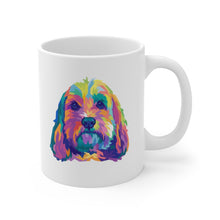 Load image into Gallery viewer, Colorful pop art illustration of doodle dog, perhaps a cockapoo or golden doodle on white ceramic mug with handle on right
